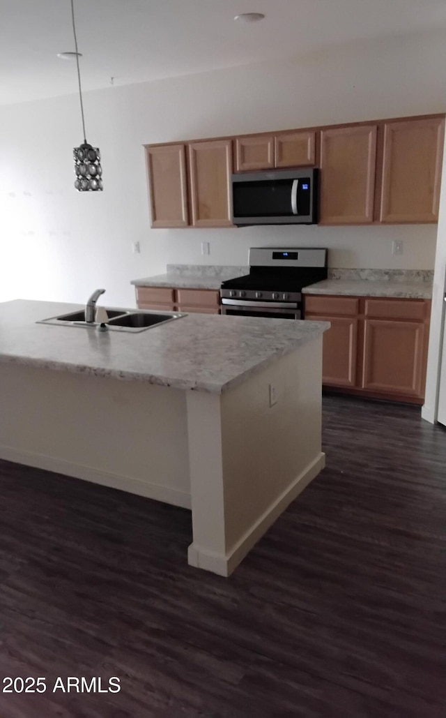7284 E Gamebird Way, San Tan Valley, AZ 85143 - kitchen featuring appliances with stainless steel finishes, dark wood finished floors, pendant lighting, a center island with sink, and light stone countertops