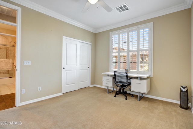 home office featuring light colored carpet, ornamental molding, ceiling fan, and baseboards