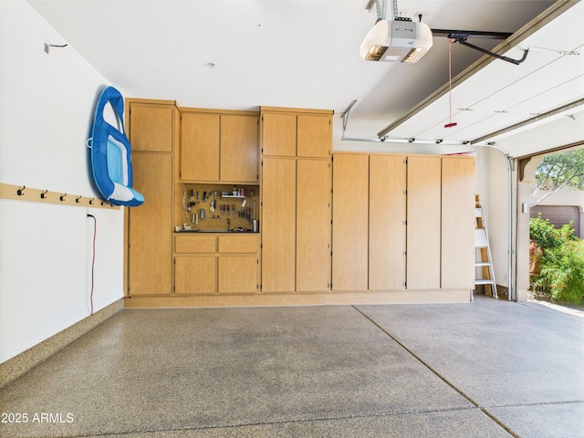 garage featuring a garage door opener
