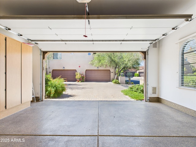 garage with baseboards