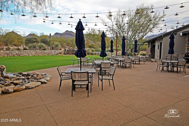 view of patio with a mountain view