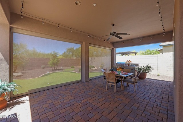 view of patio / terrace featuring ceiling fan