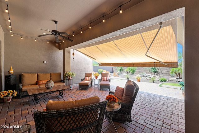 view of patio featuring ceiling fan and outdoor lounge area