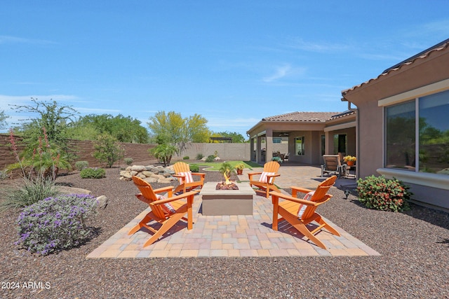 view of patio / terrace with a fire pit