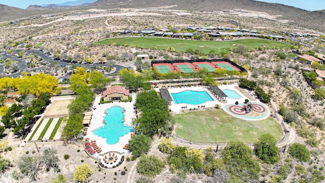 birds eye view of property featuring a mountain view