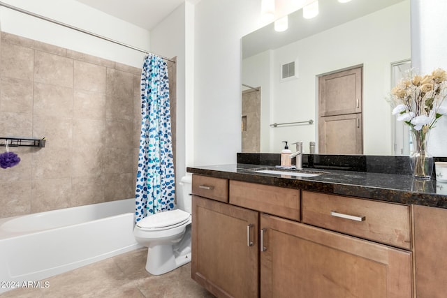 full bathroom with toilet, vanity, tile patterned flooring, and shower / tub combo with curtain