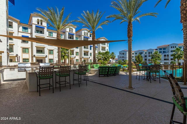 view of patio with grilling area and exterior kitchen