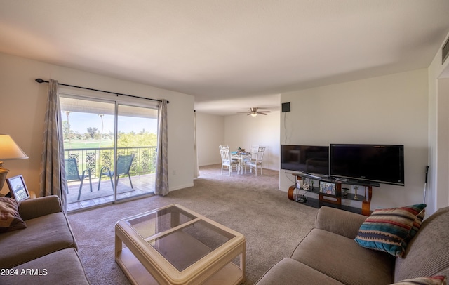 carpeted living room featuring ceiling fan