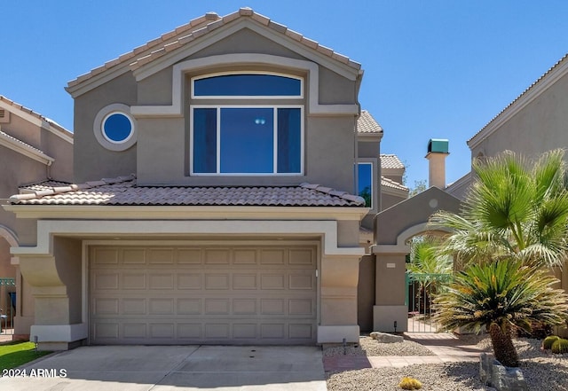 view of front of property with a garage