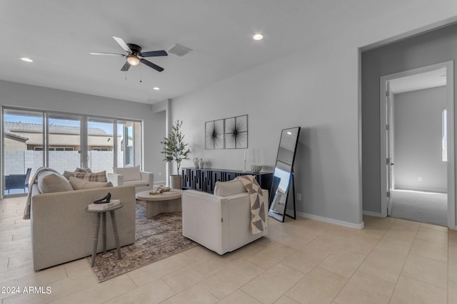 living room featuring ceiling fan