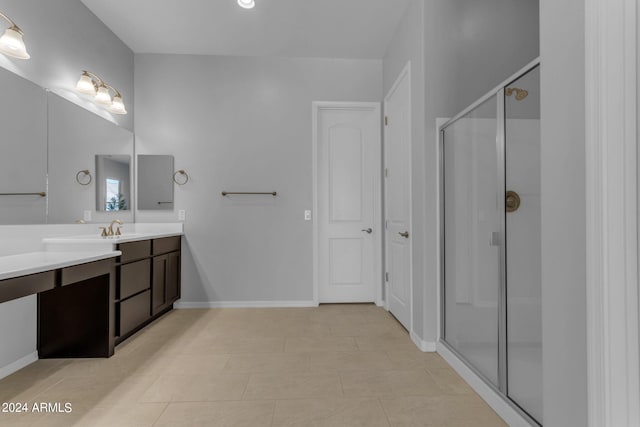 bathroom featuring vanity and walk in shower