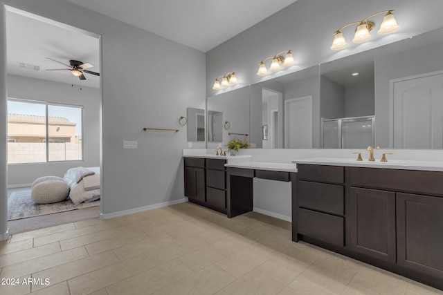 bathroom featuring ceiling fan, tile patterned flooring, vanity, and walk in shower