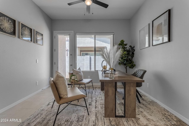 office with ceiling fan and light tile patterned floors