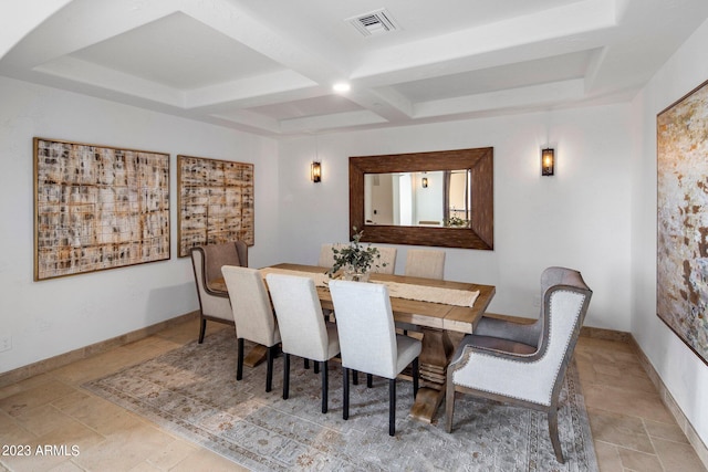 dining space with beamed ceiling and coffered ceiling