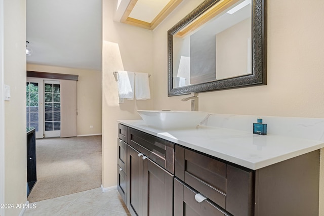 bathroom featuring vanity and tile patterned flooring