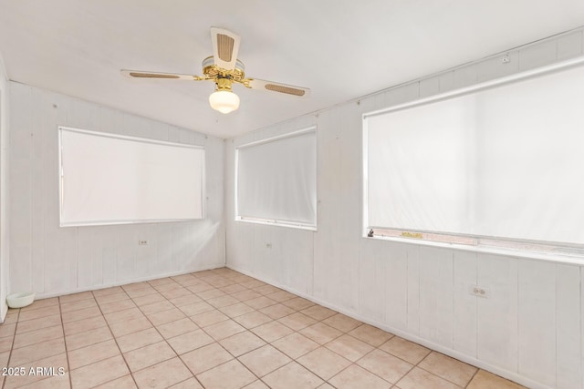 spare room featuring ceiling fan