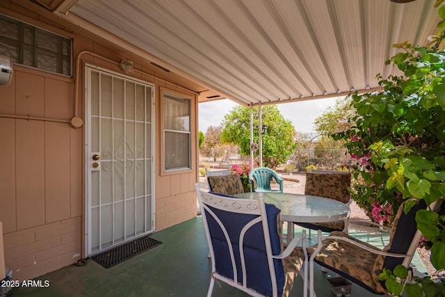 view of patio featuring outdoor dining space