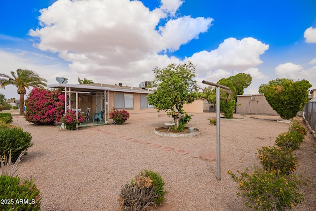 exterior space featuring fence and a patio area