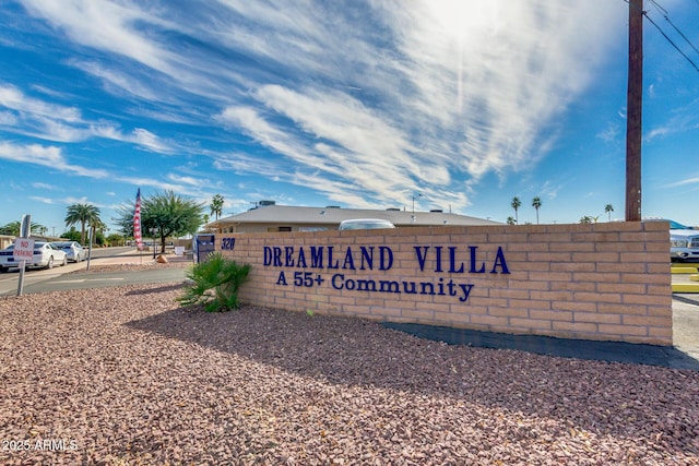 view of community sign