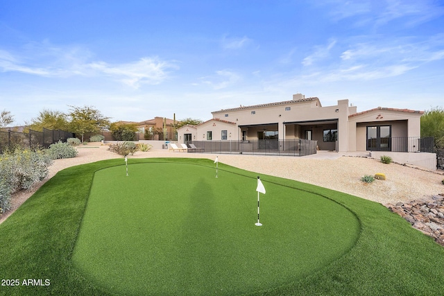 view of community featuring a patio area and fence