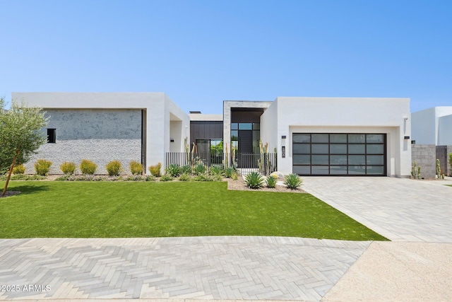 6908 E Cactus Wren Rd, Paradise Valley, AZ 85253 - modern home with a garage, stucco siding, and decorative driveway
