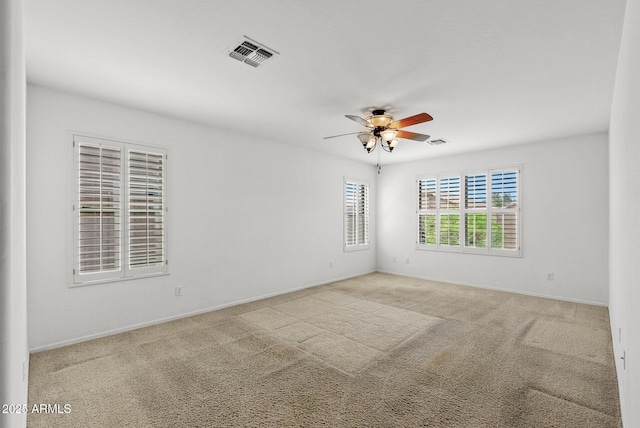 4404 W Ellis St, Laveen, AZ 85339 - carpeted spare room with ceiling fan and baseboards