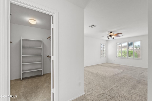 4404 W Ellis St, Laveen, AZ 85339 - carpeted empty room featuring ceiling fan and baseboards