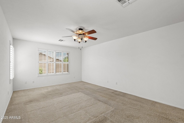 4404 W Ellis St, Laveen, AZ 85339 - carpeted empty room with ceiling fan and baseboards