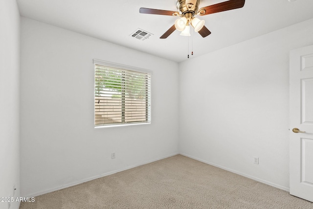 4404 W Ellis St, Laveen, AZ 85339 - carpeted spare room featuring a ceiling fan and baseboards