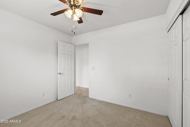 4404 W Ellis St, Laveen, AZ 85339 - unfurnished bedroom with carpet floors, a closet, baseboards, and a ceiling fan