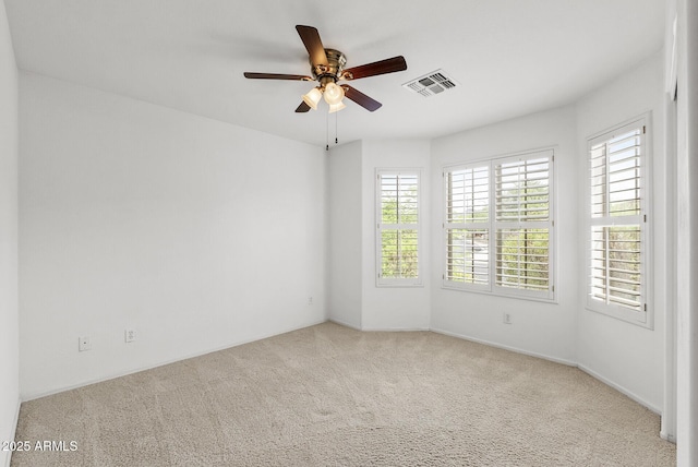 4404 W Ellis St, Laveen, AZ 85339 - empty room with ceiling fan and carpet