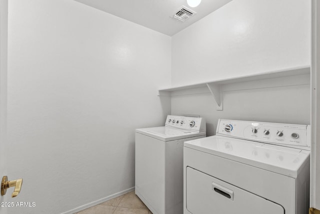 4404 W Ellis St, Laveen, AZ 85339 - laundry room with independent washer and dryer, baseboards, and light tile patterned floors
