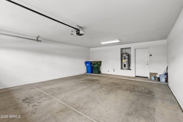 4404 W Ellis St, Laveen, AZ 85339 - garage featuring water heater and a garage door opener