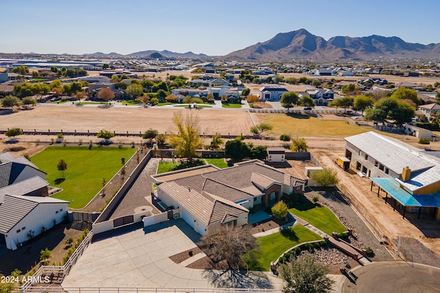 birds eye view of property featuring a mountain view