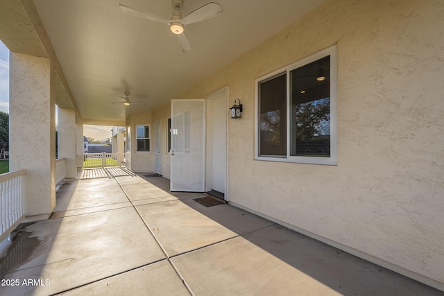 view of patio with ceiling fan