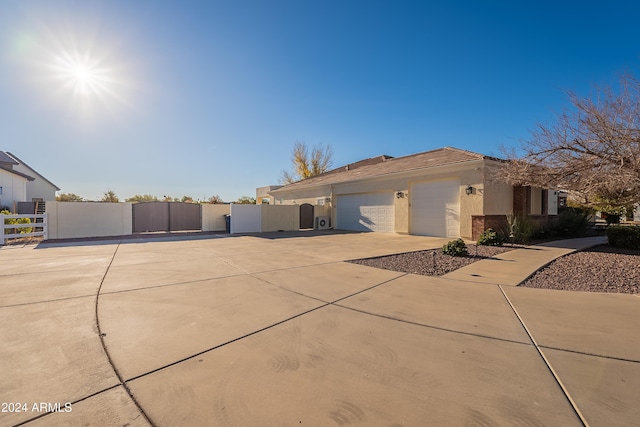 view of side of home with a garage