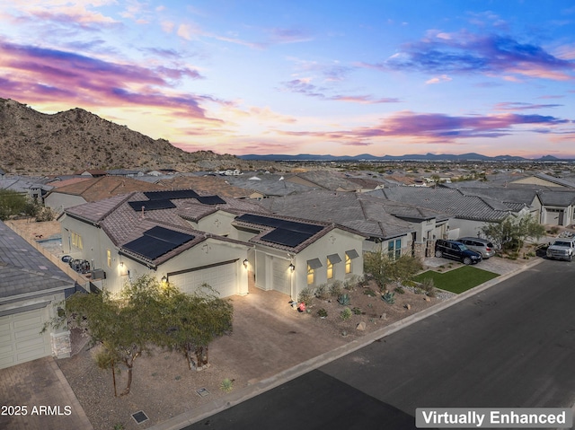 exterior space with a residential view and a mountain view