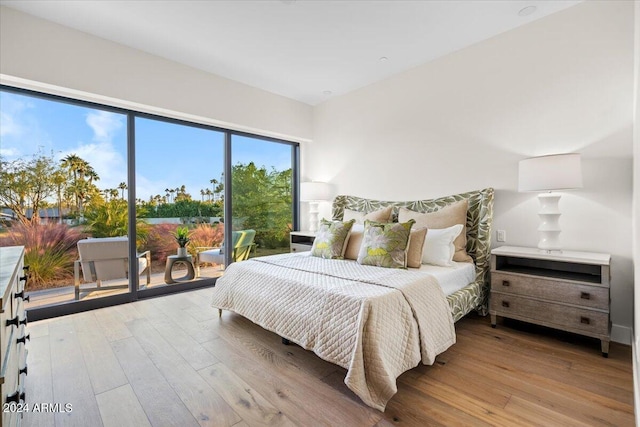 bedroom with light wood-type flooring