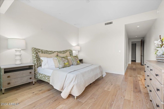 bedroom featuring light hardwood / wood-style floors