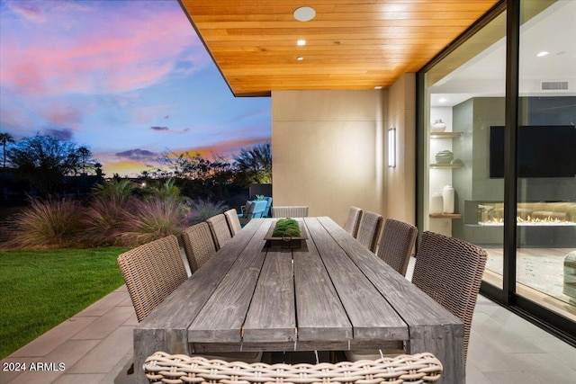 dining area with wooden ceiling