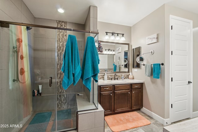 bathroom with vanity and walk in shower