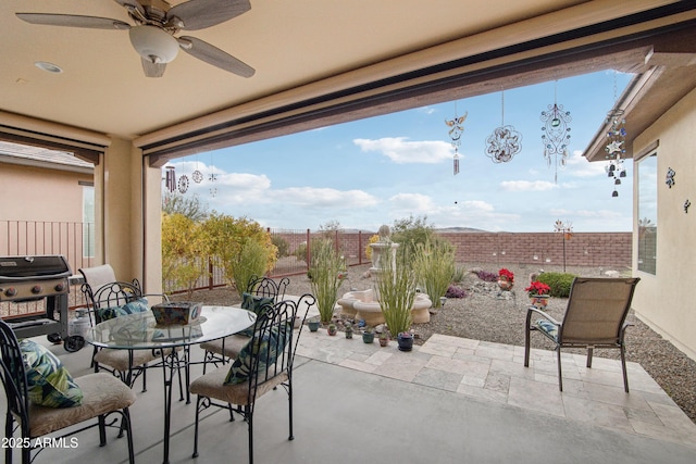 view of patio / terrace with grilling area and ceiling fan