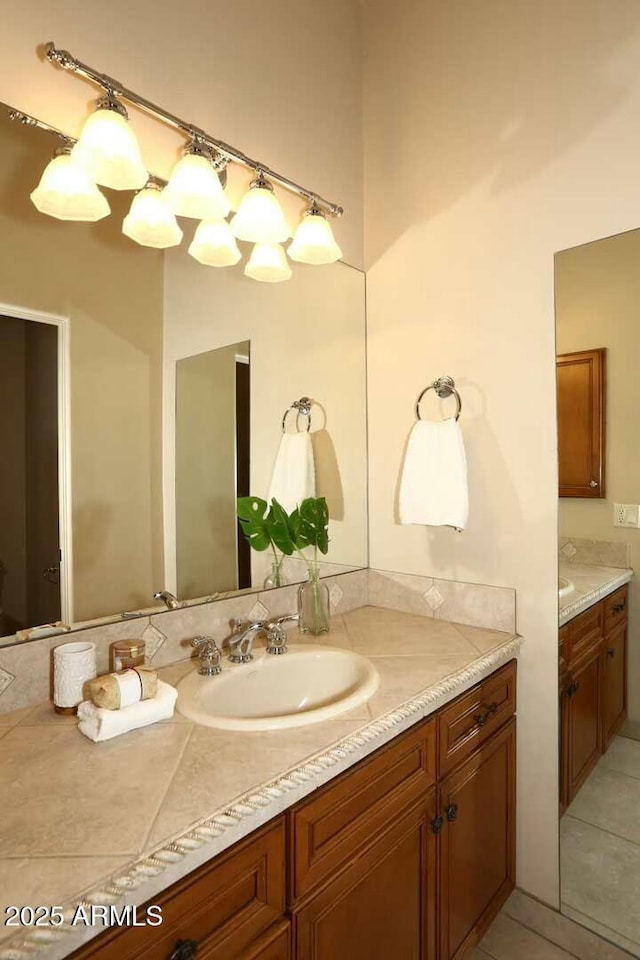 bathroom featuring vanity and tile patterned flooring
