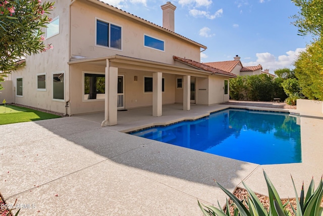 view of pool featuring a patio