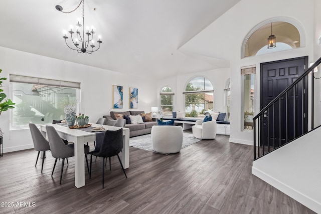 dining space featuring an inviting chandelier and dark hardwood / wood-style floors