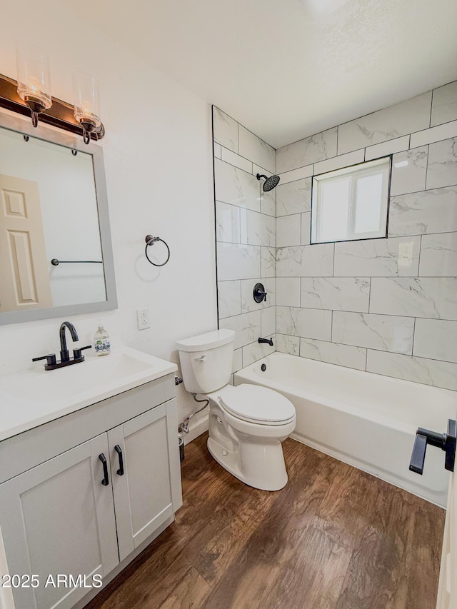 8445 S 7th Ave, Phoenix, AZ 85041 - full bath with toilet, vanity, wood finished floors, and  shower combination