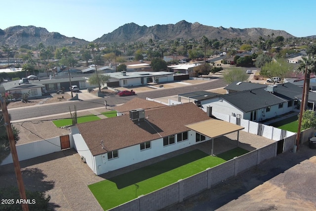 drone / aerial view with a residential view and a mountain view