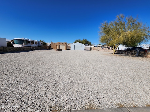 view of yard featuring a garage