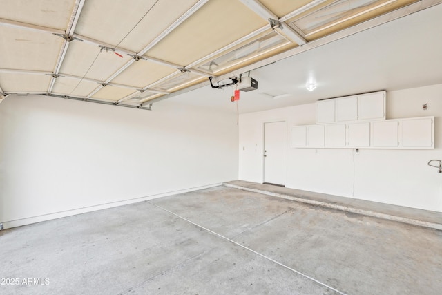 garage featuring a garage door opener