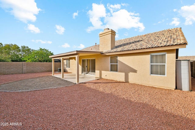 rear view of property with a patio